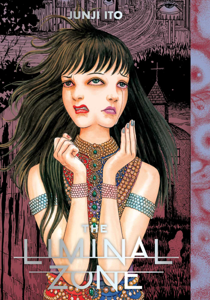 The cover of 'The Liminal Zone' by Junji Ito. It depicts a woman with long black hair wearing a red and blue dress covered in elaborate bead decorations, and many beaded bracelets on her wrists and upper arms. She holds her hands up close to her head, which has two faces with two noses and mouths but three eyes. Depending on which eyes you look at, she is either looking to the right and crying, or looking to the left angry. The background is black and red, showing elements from stories within the book such as a church, a dark alley, a flowing river and signs with crying eyes.